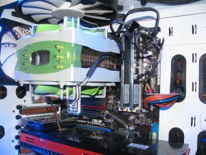 IMG_0302 Here, you can see the tight clearances around the RAM and the case's exhaust fan